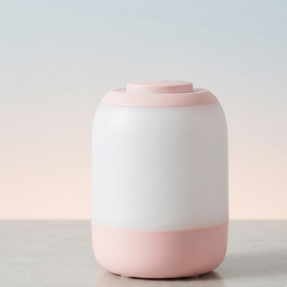 Veilleuse de nuit rose, portable et adaptée aux besoins des tout-petits.